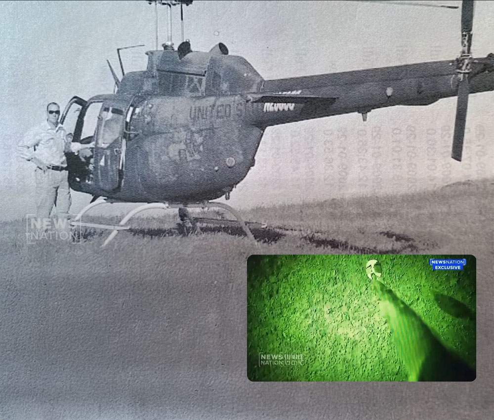 Barber junto a un helicoptero de la Fuerza Aérea