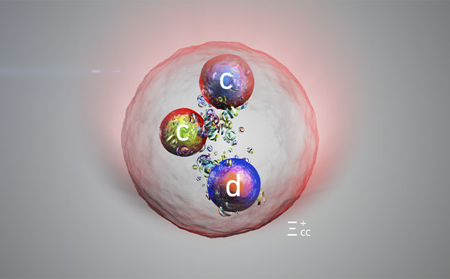 Representación artística de la nueva partícula, que contiene dos quarks encanto y un quark abajo (CERN)